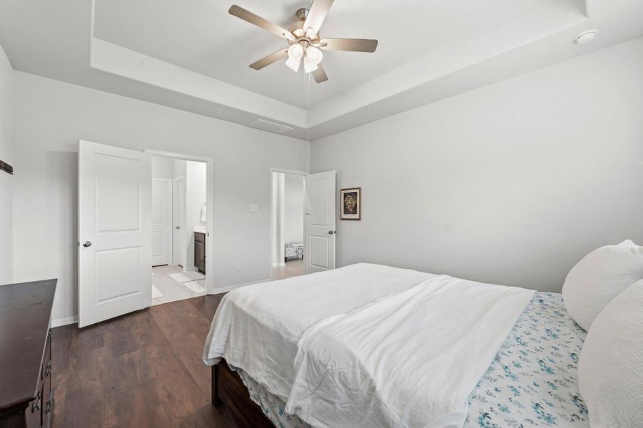 Your own peaceful escape awaits in this oversized primary bedroom with spa-like ensuite access. Your own peaceful escape awaits in this oversized primary bedroom with spa-like ensuite access.
