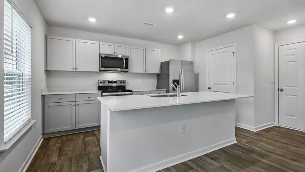 Furnished interior view inside a new home in Wilson's Ridge, Wilson's Mills (Image 4).