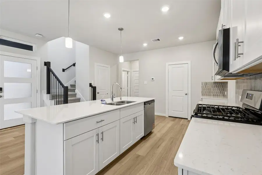 Furnished interior view inside a new home in Pinewood Trails - City Series, Atascocita (Image 8).