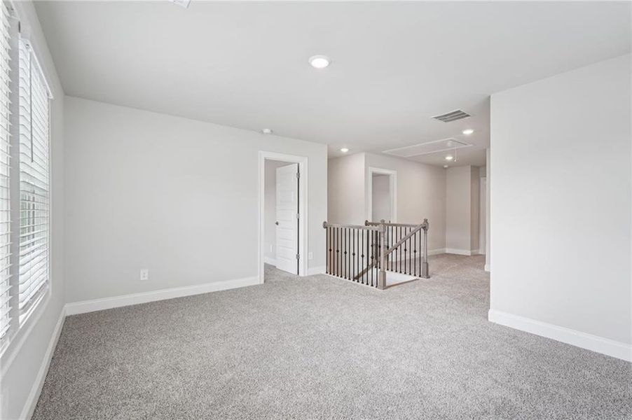 Spacious, unfurnished interior of a new home in Hemingway - Reserve Series, Cumming (Image 38). Spacious, unfurnished interior of a new home in Hemingway - Reserve Series, Cumming (Image 38).