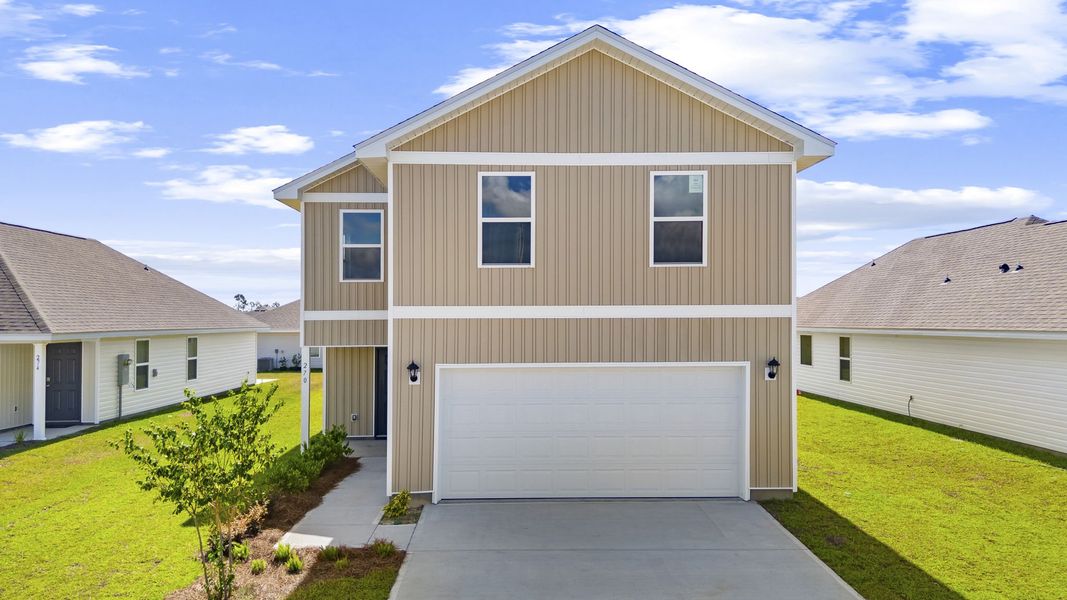 Front exterior of a new home in Park Place, Panama City, FL, highlighting curb appeal (Image 2). Front exterior of a new home in Park Place, Panama City, FL, highlighting curb appeal (Image 2).