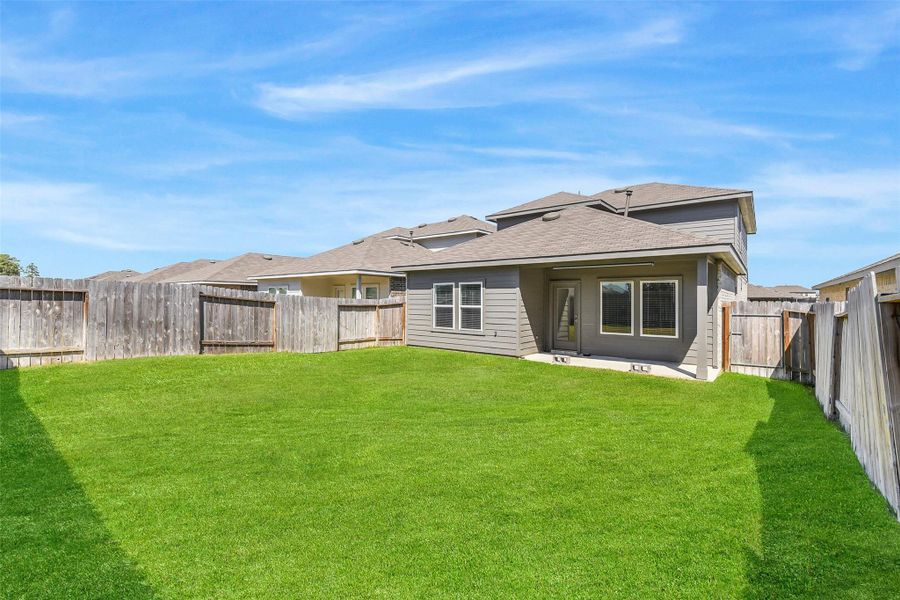 Exterior details and patio area of a home in Breckenridge Forest, Spring (Image 2). Exterior details and patio area of a home in Breckenridge Forest, Spring (Image 2).