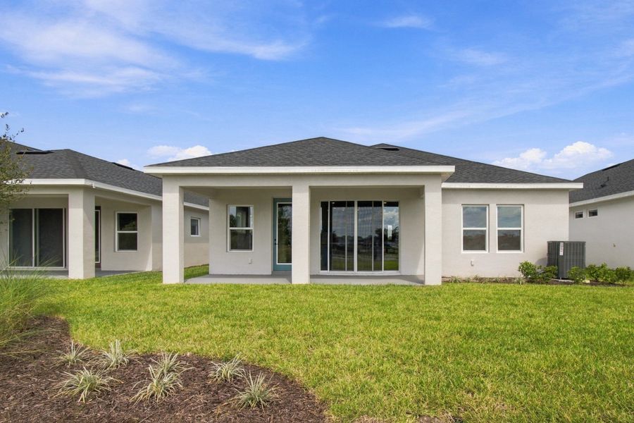 Exterior details and patio area of a home in Lakeside at Satilla, St. Cloud (Image 4).