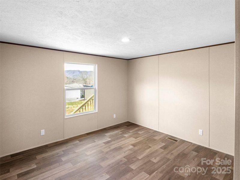 Spacious, unfurnished interior of a new home in , Old Fort (Image 18).