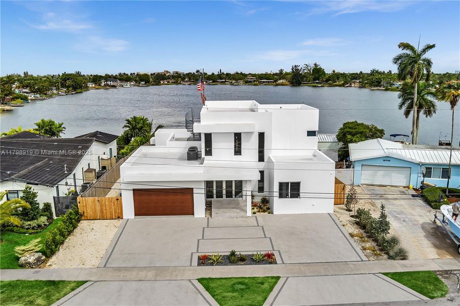 Front exterior of a new home in , Miami, FL, highlighting curb appeal (Image 17).