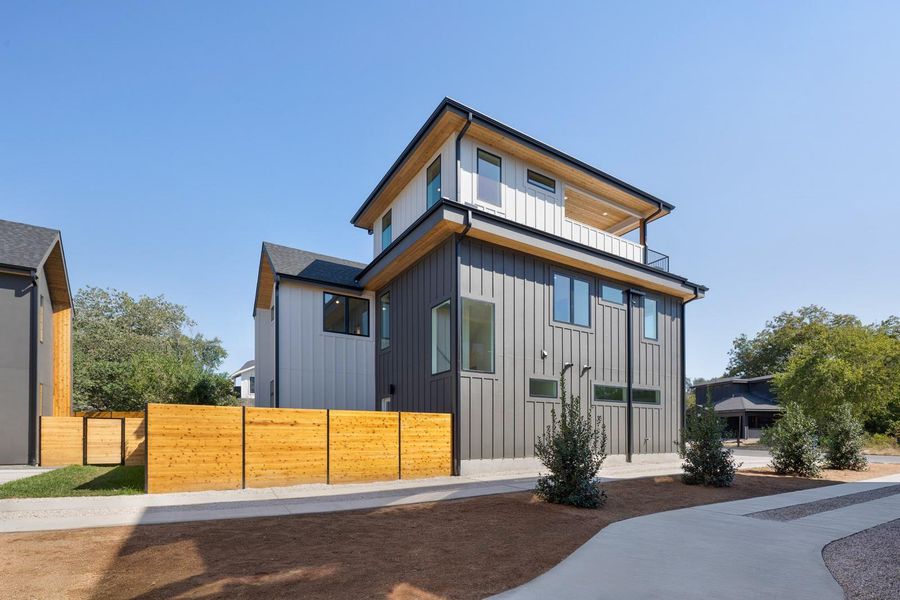 Modern home with board and batten siding Modern home with board and batten siding