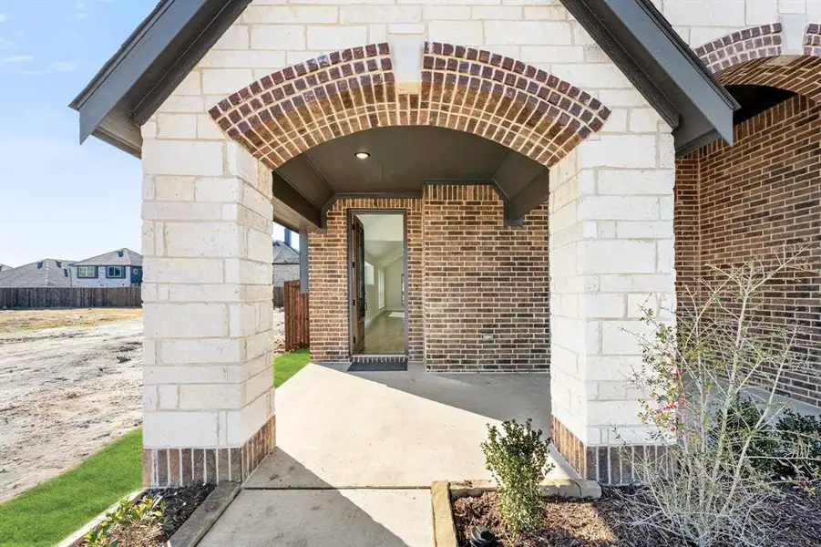Exterior details and patio area of a home in Georgetown at Kings Fort, Kaufman (Image 3).