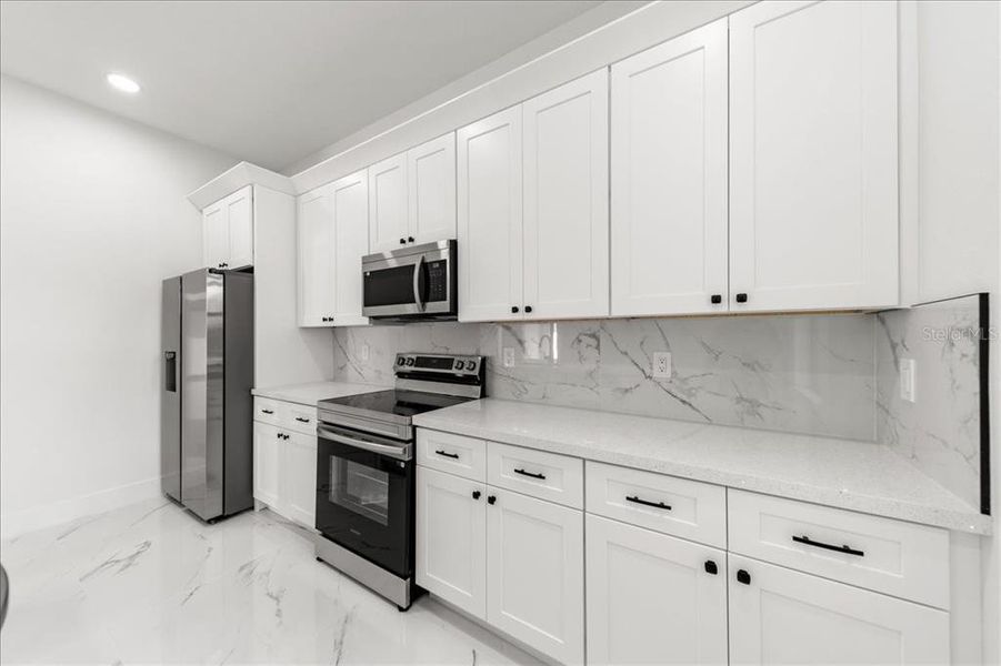 Furnished interior view inside a new home in , Cape Coral (Image 12).