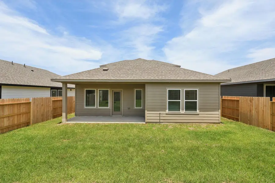 Front exterior of a new home in Pine Lake Cove - Premier Series, Montgomery, TX, highlighting curb appeal (Image 2).