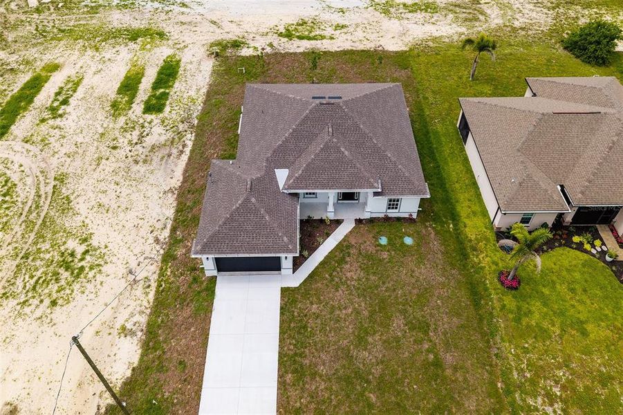 Front exterior of a new home in , Cape Coral, FL, highlighting curb appeal (Image 20).