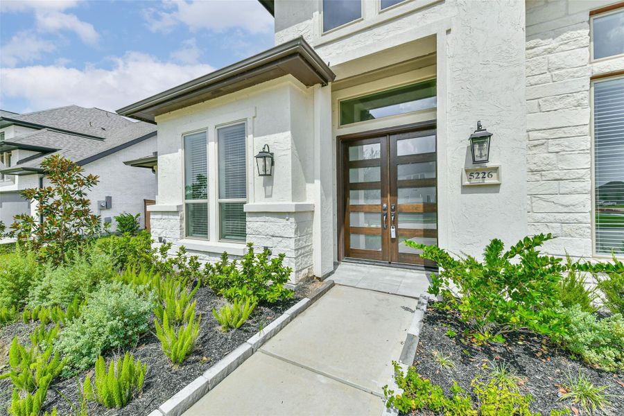 Front exterior of a new home in , Manvel, TX, highlighting curb appeal (Image 22). Front exterior of a new home in , Manvel, TX, highlighting curb appeal (Image 22).