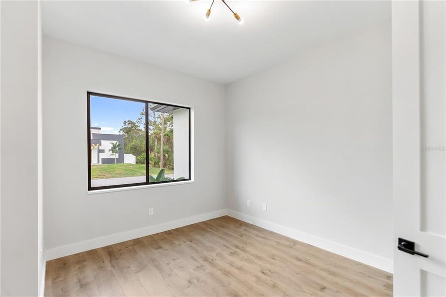 Spacious, unfurnished interior of a new home in , Port Charlotte (Image 70).