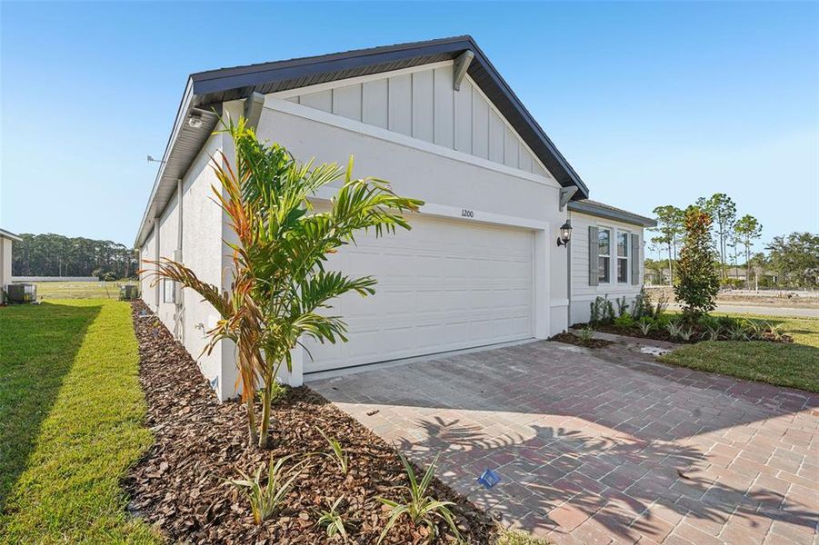 Exterior details and patio area of a home in Legends Preserve - Signature Series, Daytona Beach (Image 22). Exterior details and patio area of a home in Legends Preserve - Signature Series, Daytona Beach (Image 22).