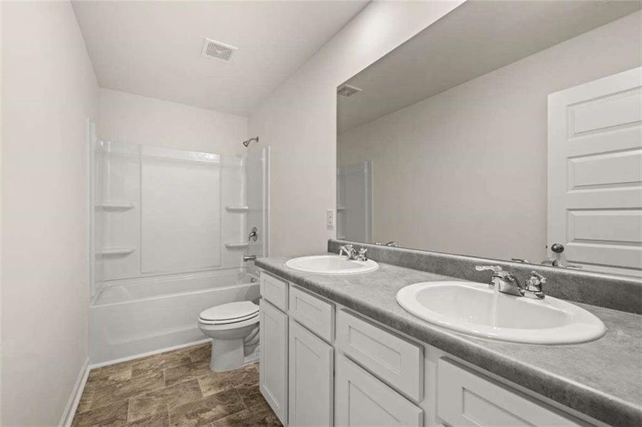 Furnished interior view inside a new home in Oakchase at Hampton, Hampton (Image 6).