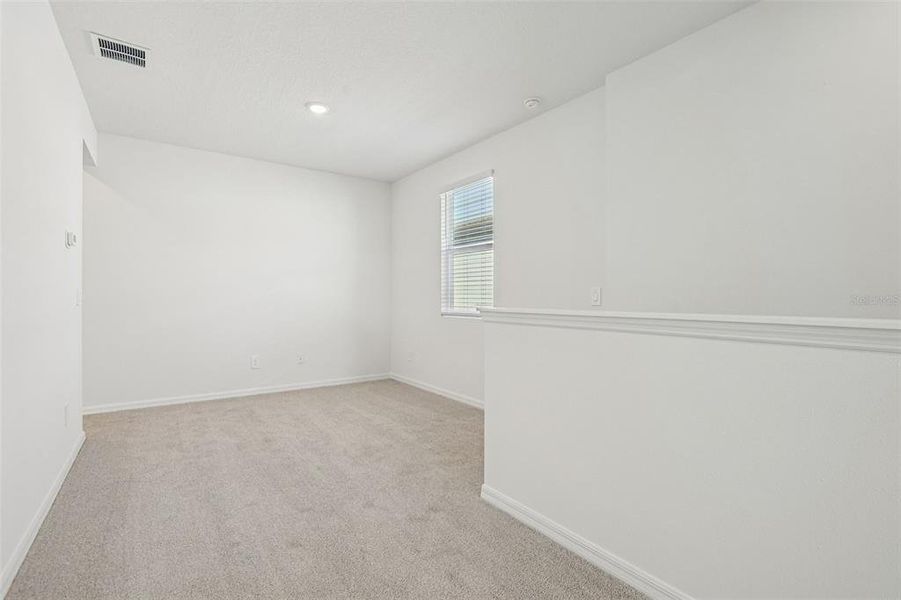 Spacious, unfurnished interior of a new home in The Meadow at Crossprairie Bungalows, St. Cloud (Image 29).