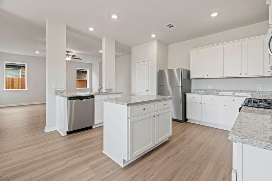 Furnished interior view inside a new home in , Iowa Colony (Image 8).