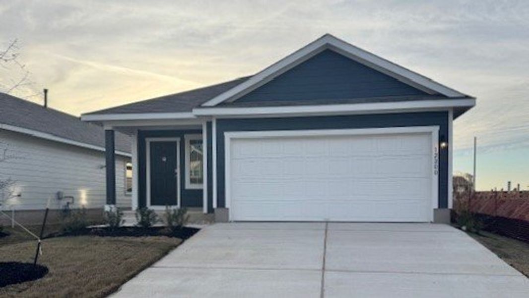 Front exterior of a new home in Durango, Mustang Ridge, TX, highlighting curb appeal (Image 1). Front exterior of a new home in Durango, Mustang Ridge, TX, highlighting curb appeal (Image 1).
