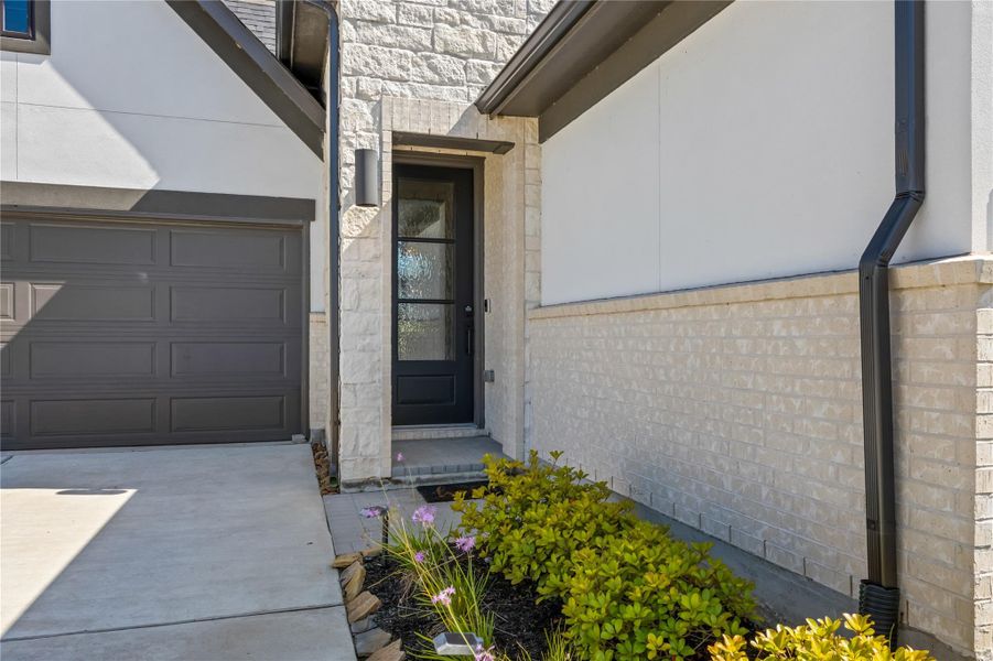 Exterior details and patio area of a home in , Cypress (Image 3).