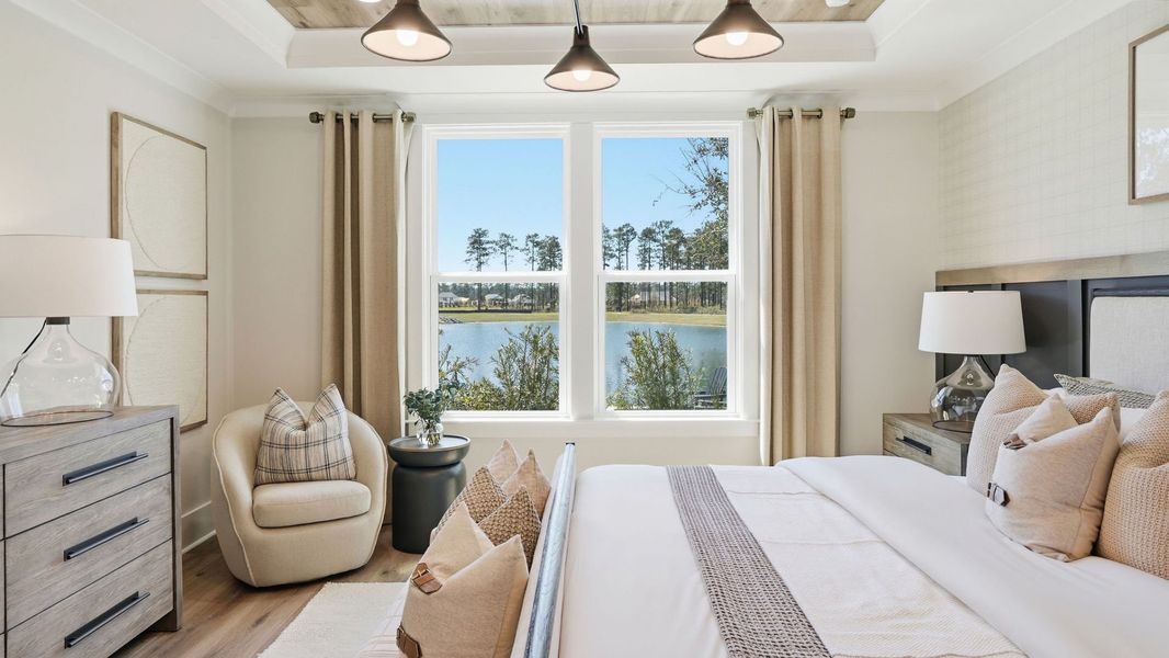 Representative furnished interior of a home built from the Mystique by Del Webb in Del Webb Point Hope, Charleston (Image 16).