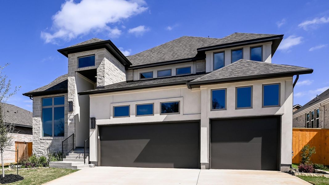 Front exterior of a new home in 6 Creeks, Kyle, TX, highlighting curb appeal (Image 23).