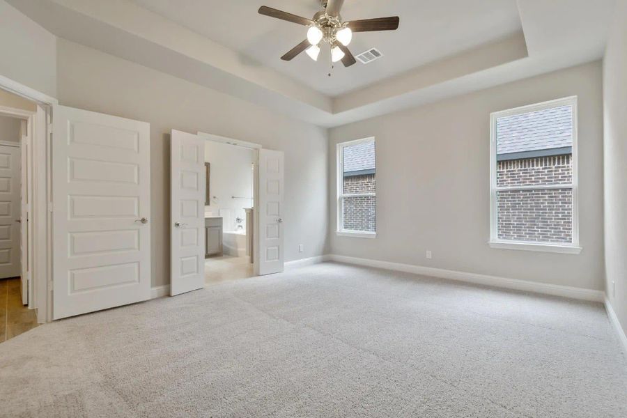 Primary Bedroom | Concept 2129 at Redden Farms - Classic Series in Midlothian, TX by Landsea Homes