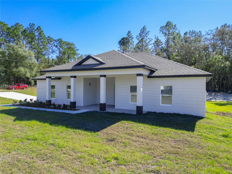 Exterior details and patio area of a home in , Ocala (Image 18). Exterior details and patio area of a home in , Ocala (Image 18).