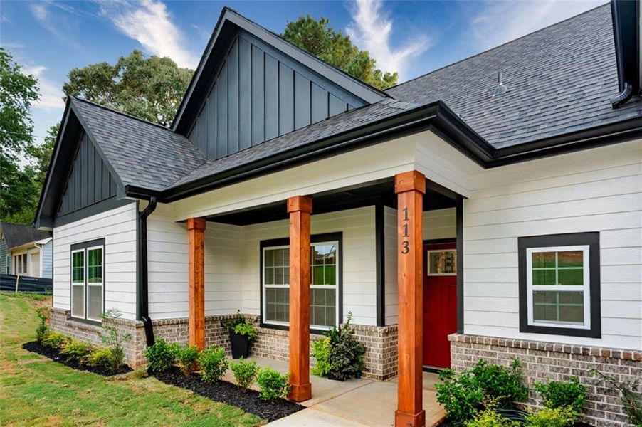 Front exterior of a new home in , Stockbridge, GA, highlighting curb appeal (Image 19).