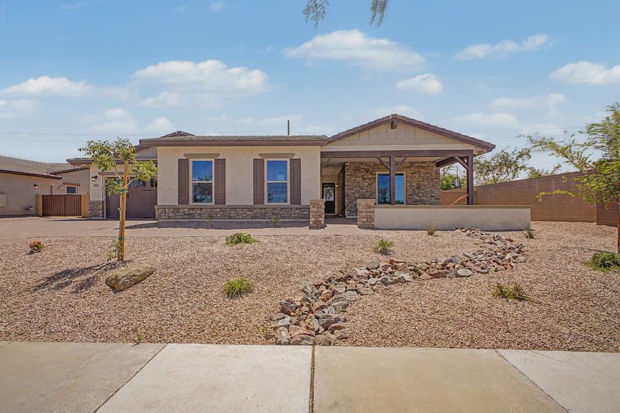 Front exterior of a new home in Bellero Estates, Queen Creek, AZ, highlighting curb appeal (Image 20). Front exterior of a new home in Bellero Estates, Queen Creek, AZ, highlighting curb appeal (Image 20).