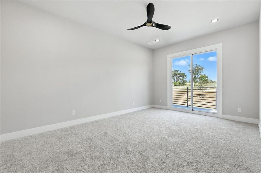 Unfurnished room with carpet floors, ceiling fan, and recessed lighting Unfurnished room with carpet floors, ceiling fan, and recessed lighting