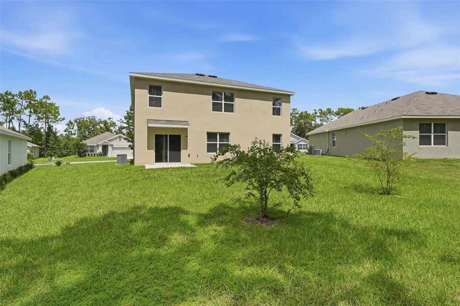 Exterior details and patio area of a home in Lake Diamond, Ocala (Image 33).