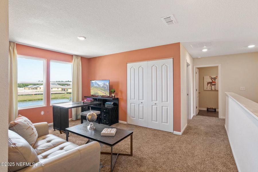 Furnished interior view inside a new home in Sawmill Branch, Palm Coast (Image 26).