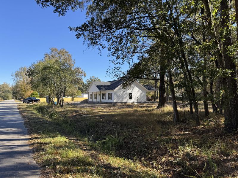 Exterior details and patio area of a home in , Cottageville (Image 15).