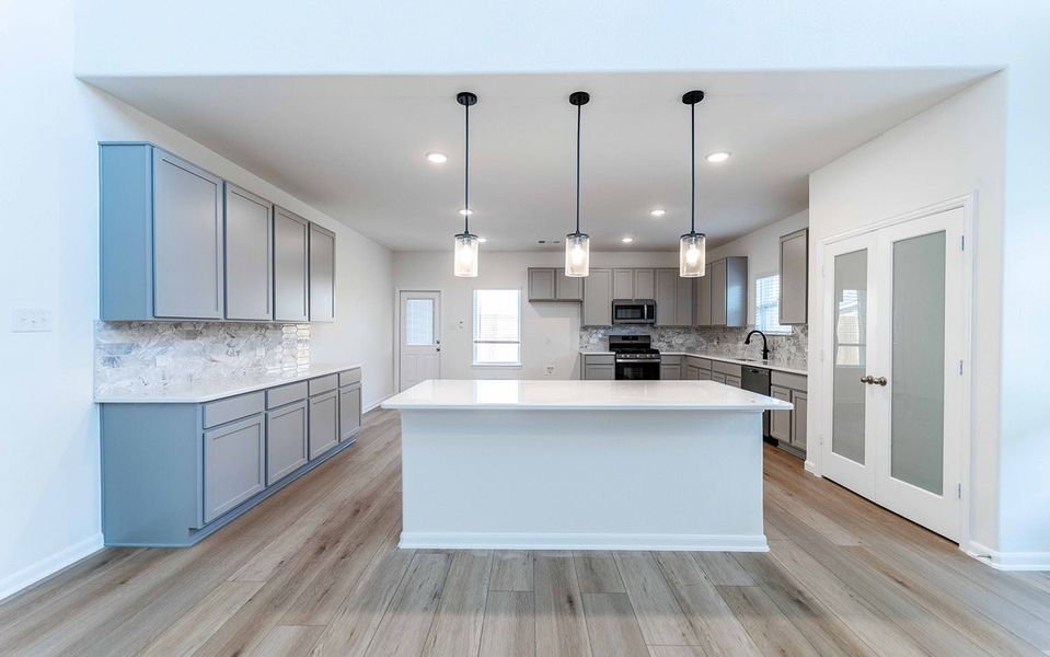 Furnished interior view inside a new home in Travis Ranch, Forney (Image 3). Furnished interior view inside a new home in Travis Ranch, Forney (Image 3).