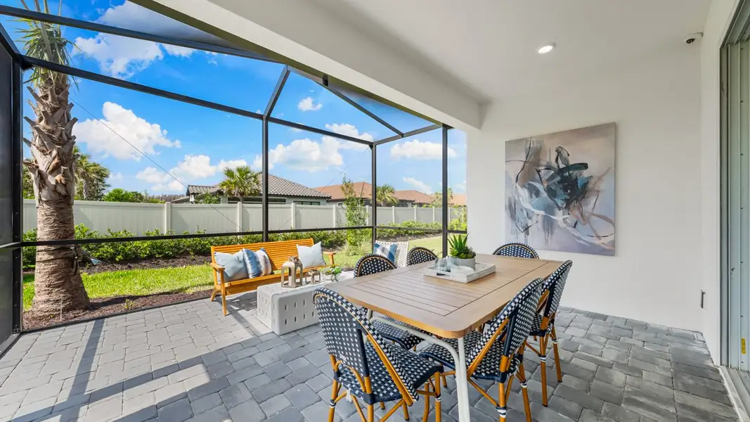 Exterior details and patio area of a home in Esplanade at Wiregrass Ranch, Wesley Chapel (Image 3). Exterior details and patio area of a home in Esplanade at Wiregrass Ranch, Wesley Chapel (Image 3).
