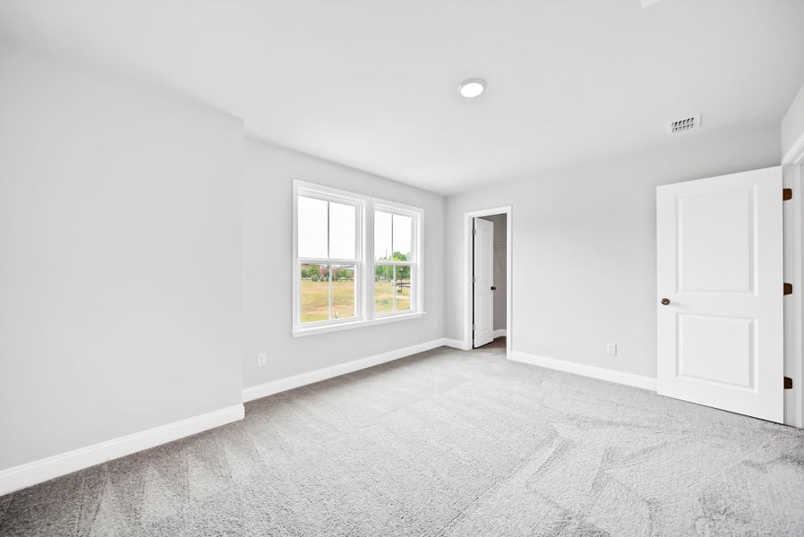 Spacious, unfurnished interior of a new home in Monroe Preserve, Chapin (Image 37).