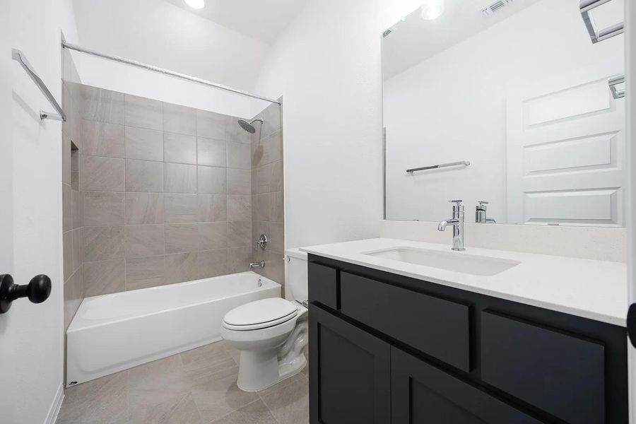 Furnished interior view inside a new home in Caliterra - 80', Dripping Springs (Image 8).