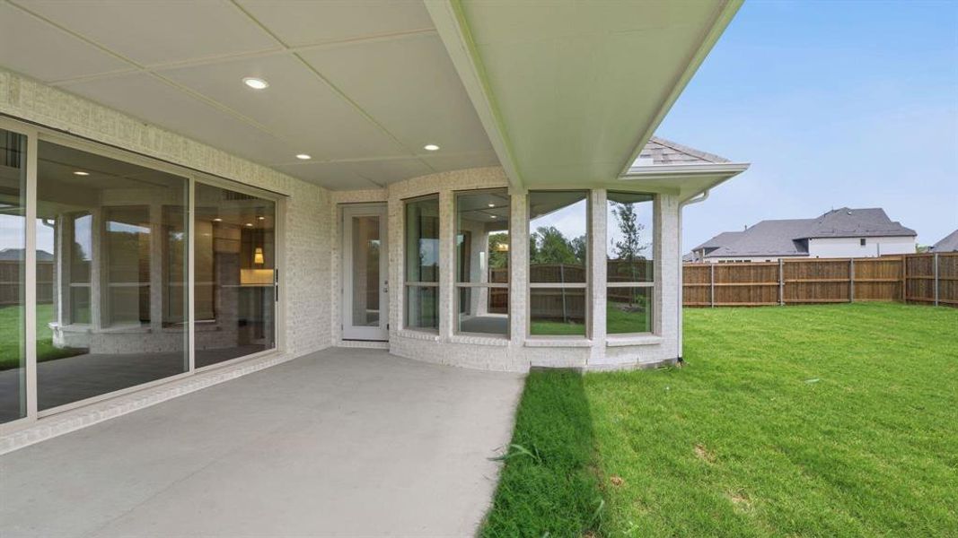 Exterior details and patio area of a home in The Parks at Wilson Creek, Celina (Image 3).