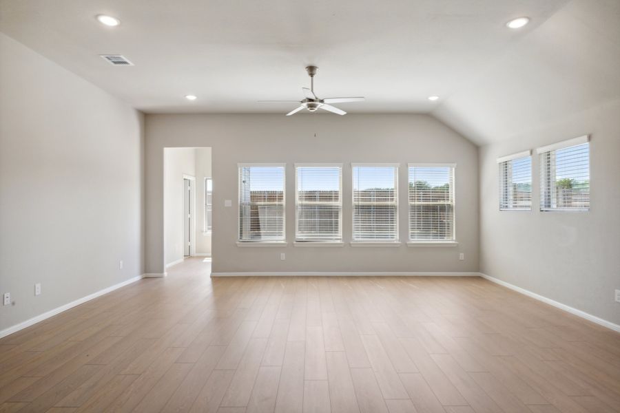 Living Room in the Diamond home plan by Trophy Signature Homes – REPRESENTATIVE PHOTO