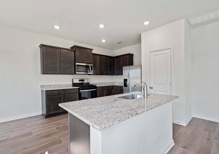 The kitchen has beautiful wood cabinetry. The kitchen has beautiful wood cabinetry.