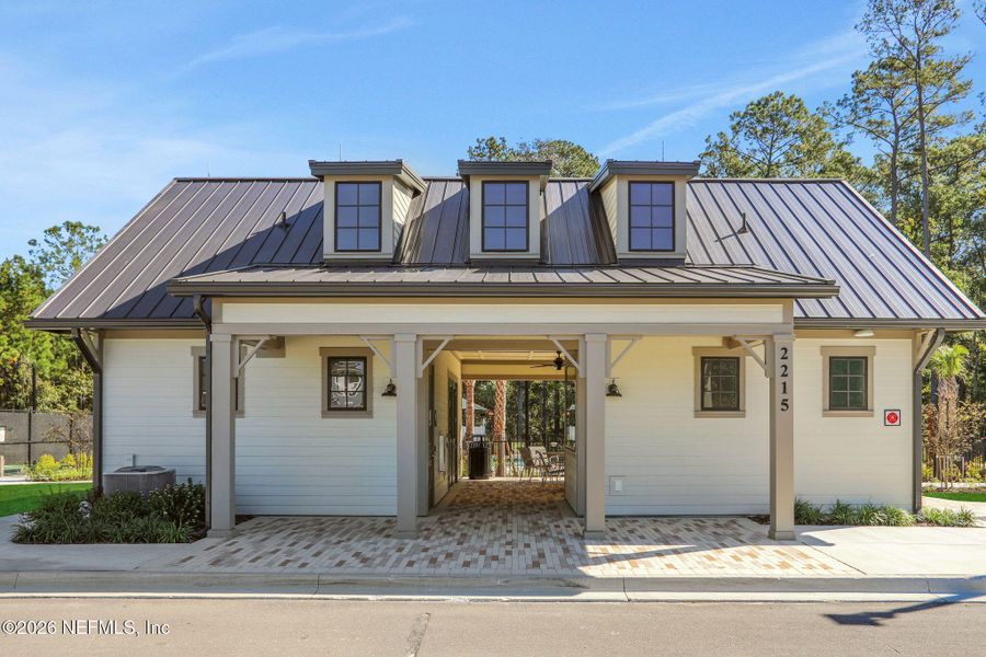 Front exterior of a new home in Jennings Farm, Middleburg, FL, highlighting curb appeal (Image 24).