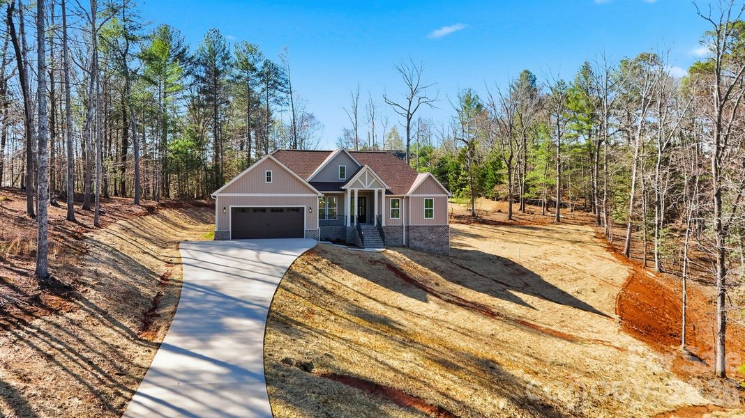 Front exterior of a new home in , Granite Falls, NC, highlighting curb appeal (Image 23). Front exterior of a new home in , Granite Falls, NC, highlighting curb appeal (Image 23).