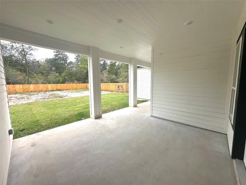 Exterior details and patio area of a home in , Huffman (Image 2).