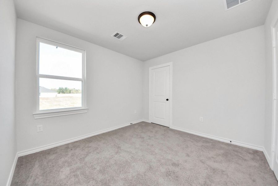 Spacious, unfurnished interior of a new home in Hill & Dale Ranch, Splendora (Image 36).
