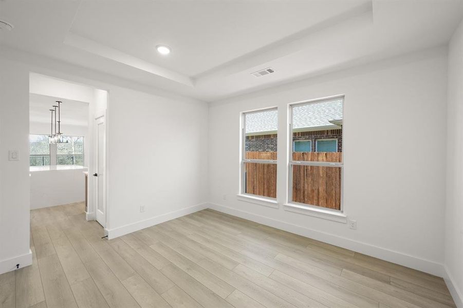 Spacious, unfurnished interior of a new home in High Country, Burleson (Image 37).