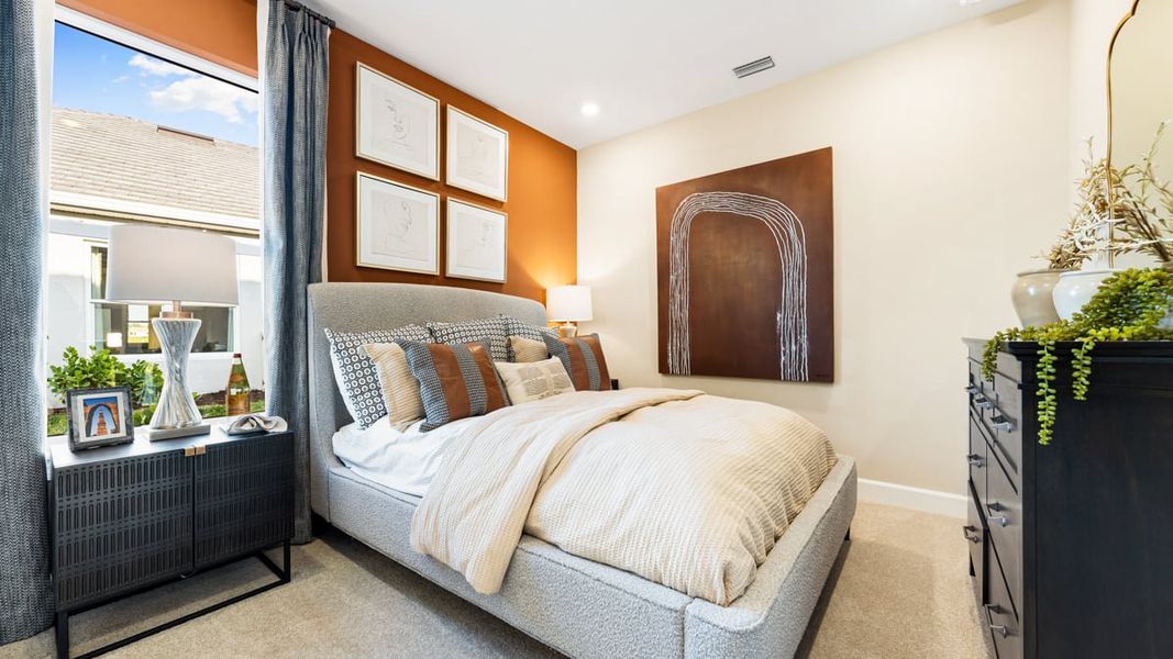 Furnished interior view inside a new home in Esplanade Lake Club, Fort Myers (Image 11).