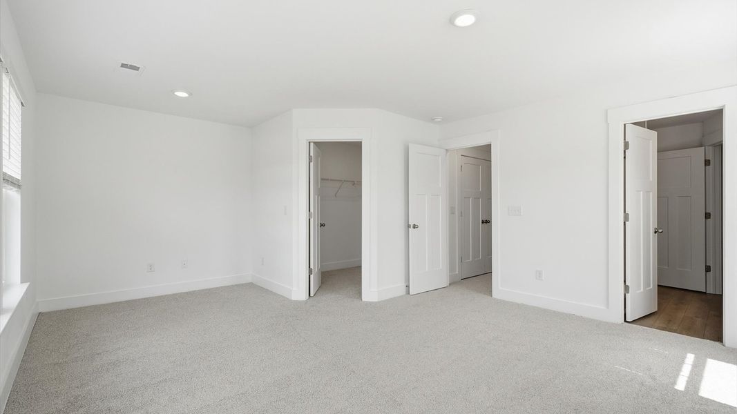 Desirable primary suite layout with spacious en suite bath in a proven, established community by DRB Homes