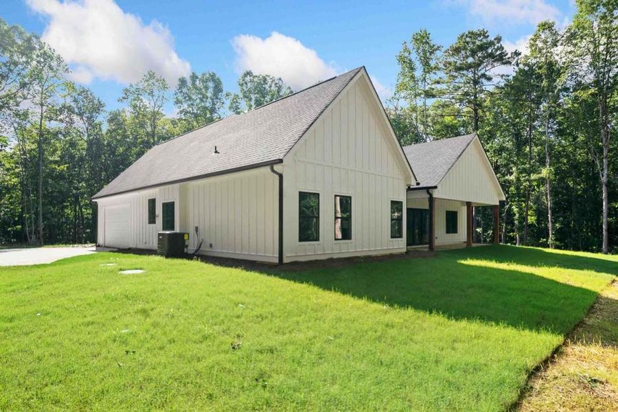 Front exterior of a new home in , Jackson, GA, highlighting curb appeal (Image 1).