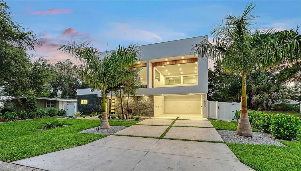 Front exterior of a new home in , Sarasota, FL, highlighting curb appeal (Image 26).
