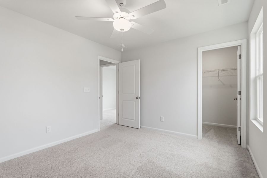 Spacious, unfurnished interior of a new home in Piper Creek, Newton (Image 38).