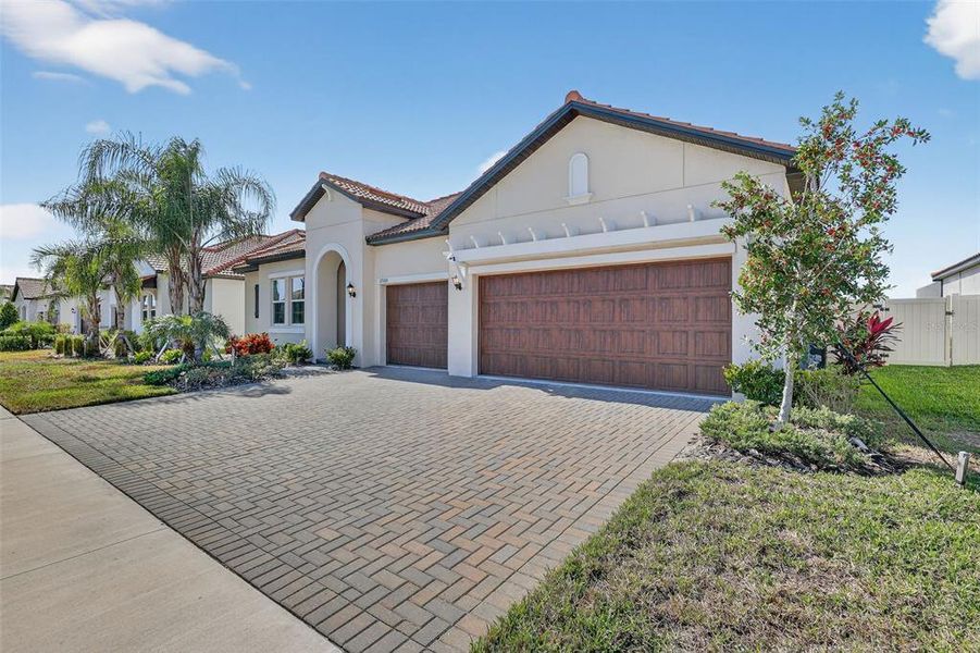 Front exterior of a new home in Southshore Bay: The Grand Estates, Wimauma, FL, highlighting curb appeal (Image 2).